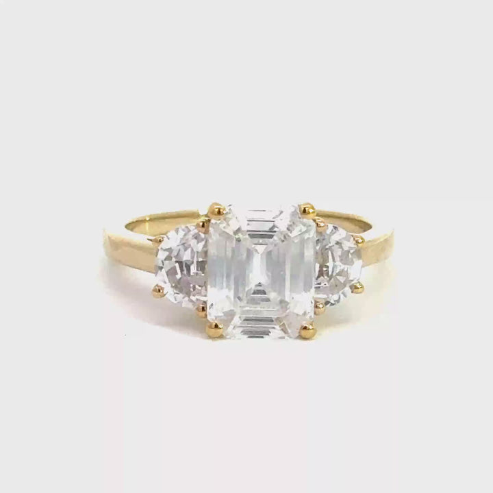 4.0 ctw emerald-cut diamond three-stone mezzaluna half-moon engagement ring