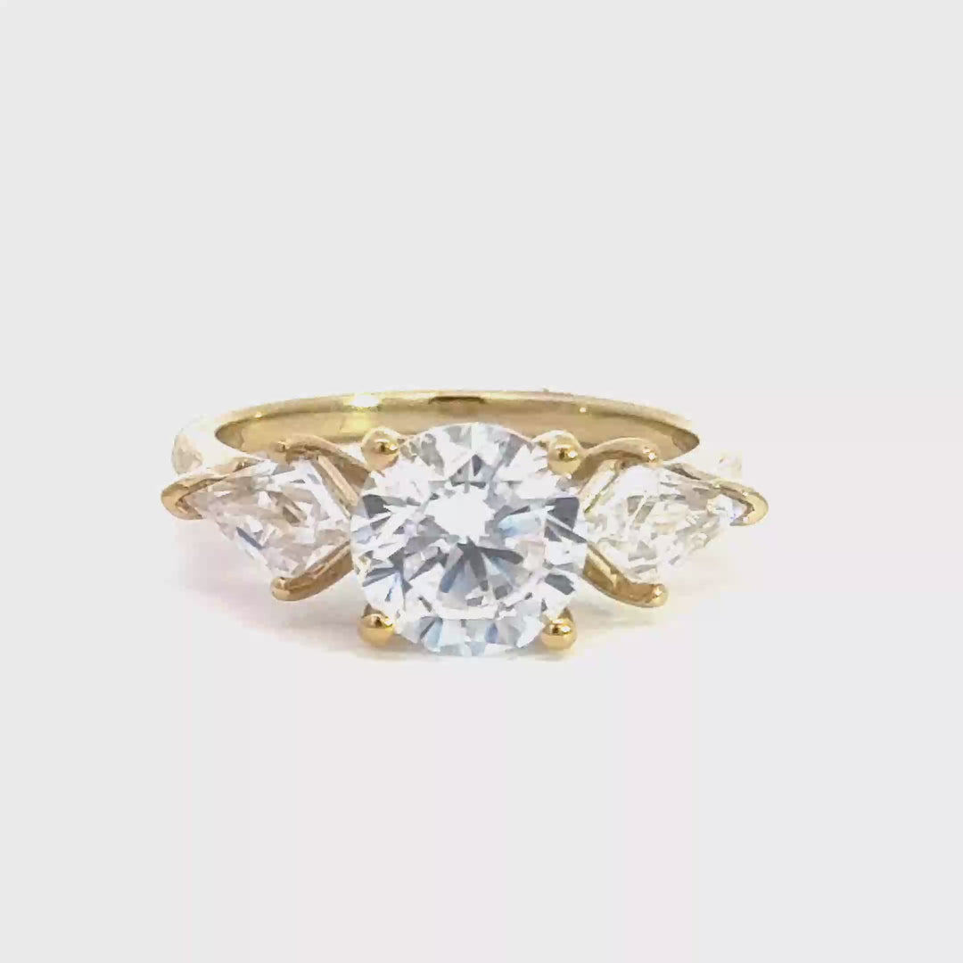 2.8 ctw round diamond three-stone kite with hidden halo engagement ring