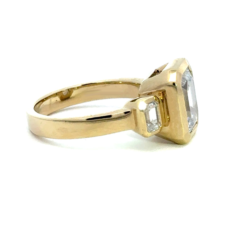 4.2 ctw emerald-cut diamond three-stone bezel wide band engagement ring - Valentshop Jewelry