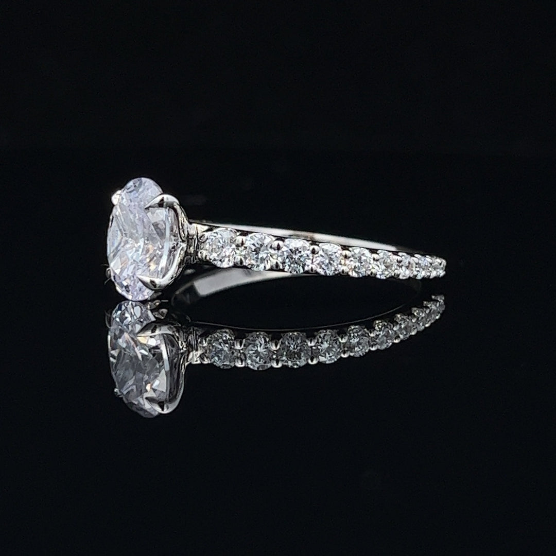 1 1/2 ctw oval diamond engagement ring with graduated diamond accents - valentshop.com