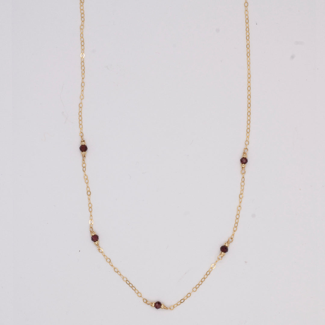 golden rondelle necklace - garnet coin charm - valentshop.com