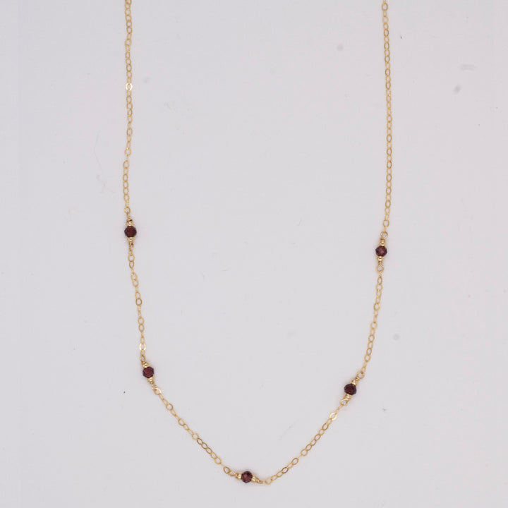 golden rondelle necklace - garnet coin charm - valentshop.com