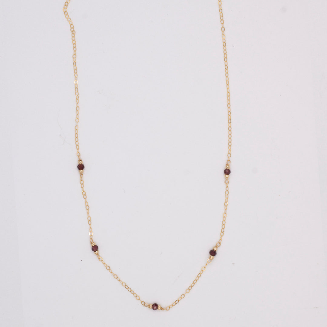 golden rondelle necklace - garnet coin charm - valentshop.com