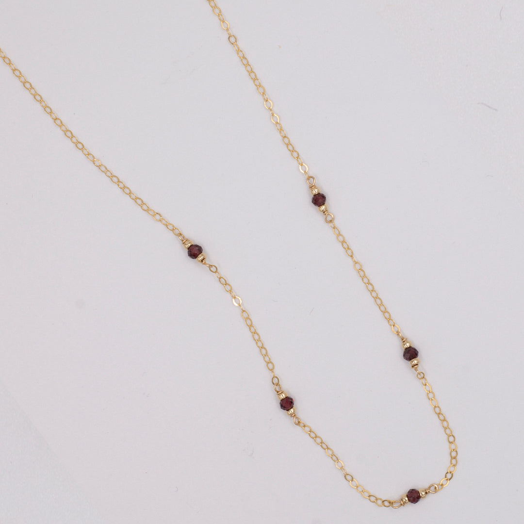golden rondelle necklace - garnet coin charm - valentshop.com