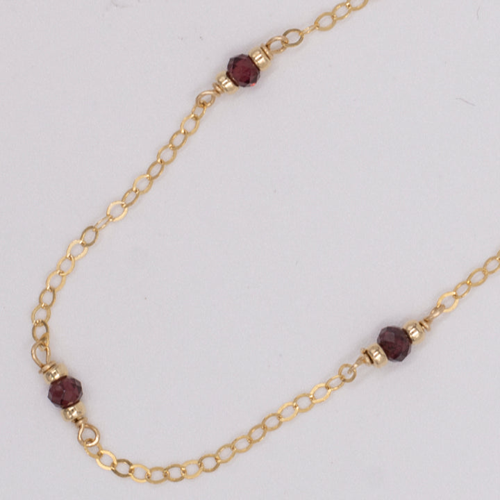 golden rondelle necklace - garnet coin charm - valentshop.com