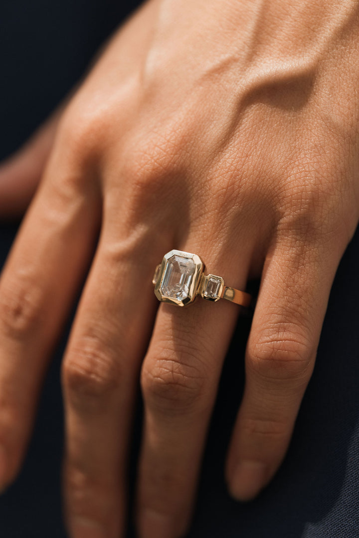 4.2 ctw emerald-cut diamond three-stone bezel wide band engagement ring - Valentshop Jewelry