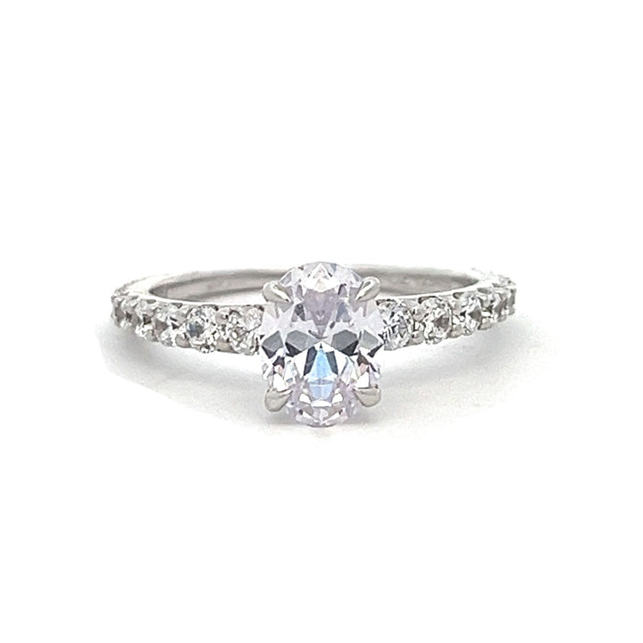 1 1/2 ctw oval diamond engagement ring with graduated diamond accents - valentshop.com