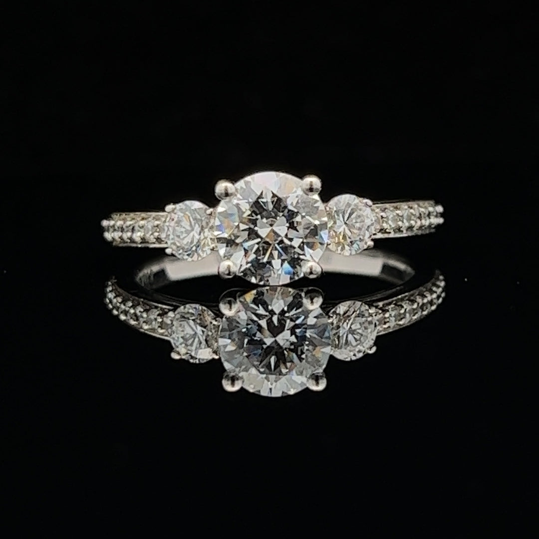1 1/2 ctw three-stone round french-set diamond engagement ring - valentshop.com