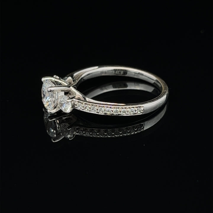 1 1/2 ctw three-stone round french-set diamond engagement ring - valentshop.com